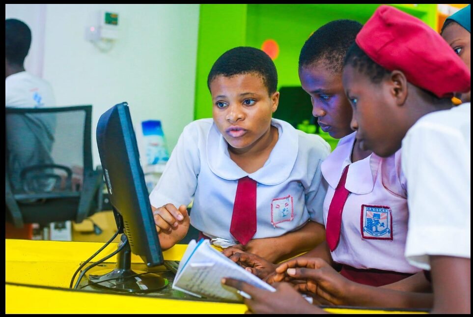 Girls in a school computer program